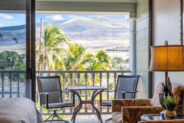 balcony featuring a mountain view