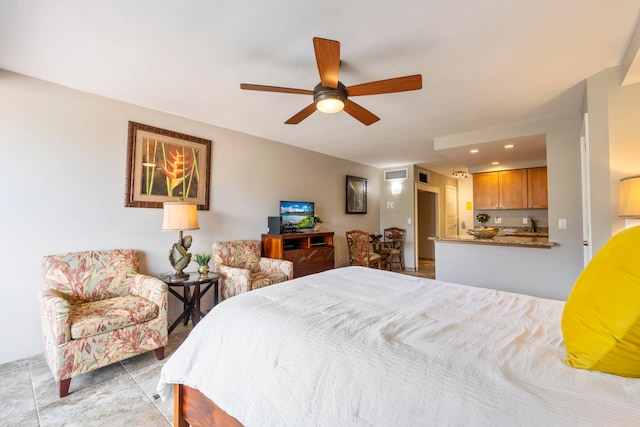 tiled bedroom featuring ceiling fan