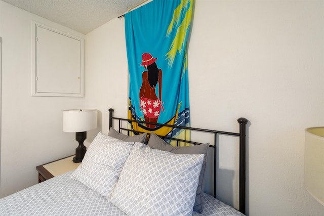 bedroom featuring a textured ceiling