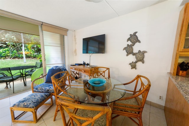 dining room featuring light tile patterned floors