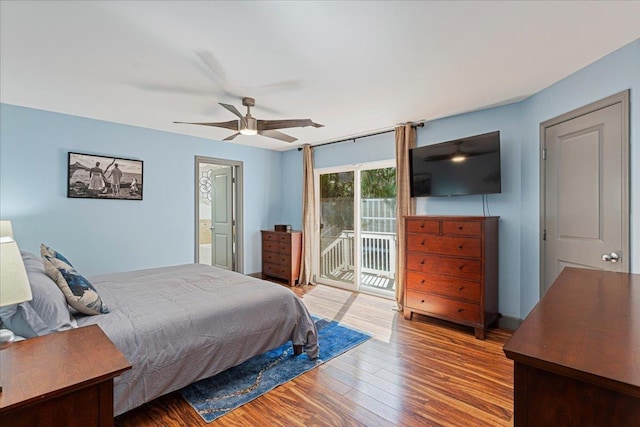 bedroom featuring access to exterior, ceiling fan, and wood-type flooring