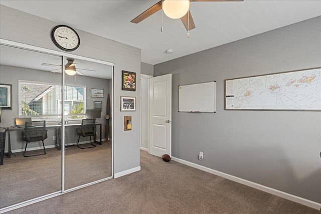 unfurnished bedroom with ceiling fan, a closet, and carpet floors