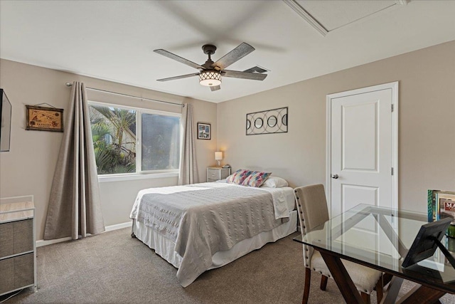 bedroom with ceiling fan and light carpet