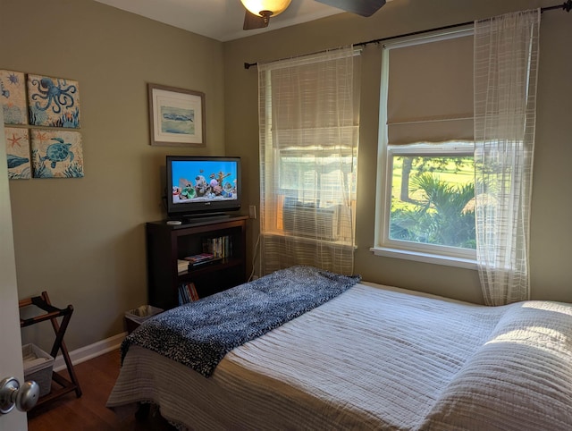 bedroom featuring hardwood / wood-style flooring