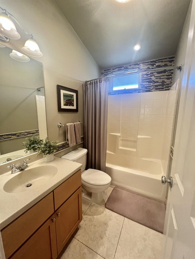 full bathroom featuring shower / bath combination with curtain, vanity, toilet, and tile patterned flooring