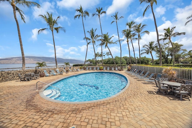 760 S Kihei Rd Unit 419, Kihei, HI 96753 - community pool with a patio area and a water and mountain view
