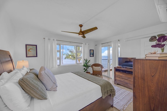 760 S Kihei Rd Unit 419, Kihei, HI 96753 - bedroom featuring access to exterior, a ceiling fan, and wood finished floors