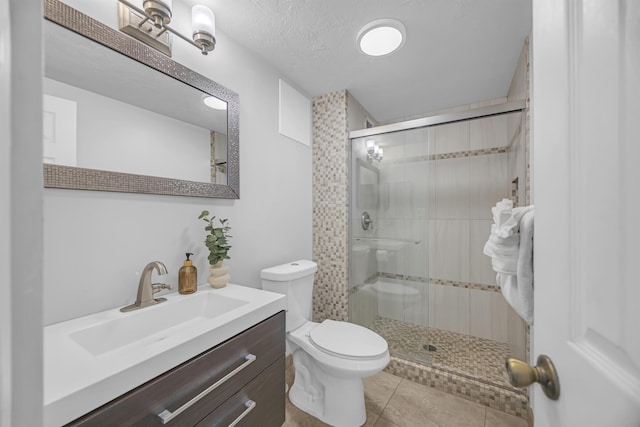 760 S Kihei Rd Unit 419, Kihei, HI 96753 - full bath featuring a stall shower, toilet, tile patterned flooring, and vanity