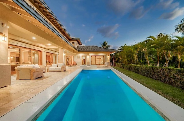 view of swimming pool featuring a patio area and an outdoor hangout area