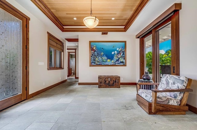 interior space featuring a tray ceiling, light tile patterned flooring, and wood ceiling