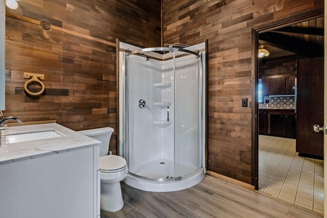 29 Hale Malia Pl, Lahaina, HI 96761 - full bath with wooden walls, toilet, a stall shower, vanity, and wood finished floors
