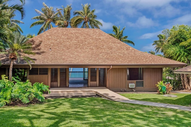 29 Hale Malia Pl, Lahaina, HI 96761 - back of house with a shingled roof and a lawn