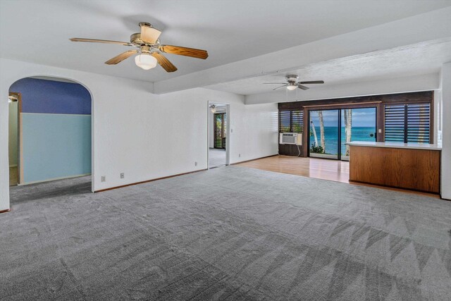 29 Hale Malia Pl, Lahaina, HI 96761 - carpeted spare room with a ceiling fan, arched walkways, cooling unit, and baseboards