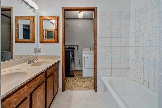 29 Hale Malia Pl, Lahaina, HI 96761 - bathroom with washer and clothes dryer, double vanity, tile walls, and tile patterned floors