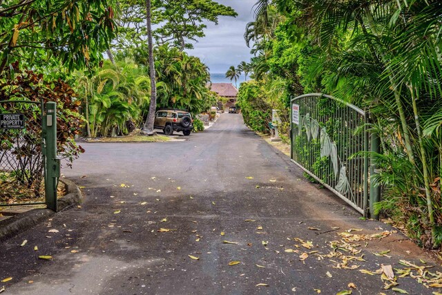 29 Hale Malia Pl, Lahaina, HI 96761 - view of asphalt road with a gate