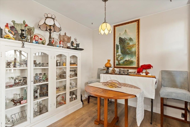 dining space featuring wood finished floors