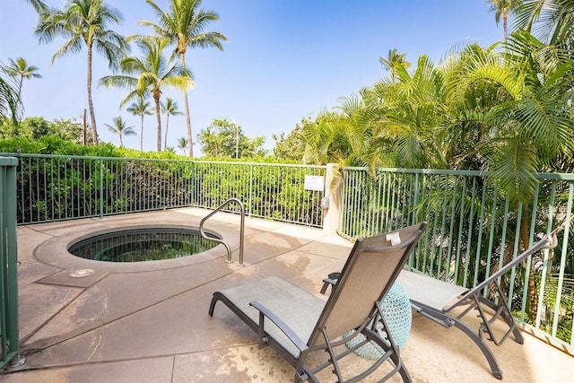 view of patio / terrace featuring a hot tub