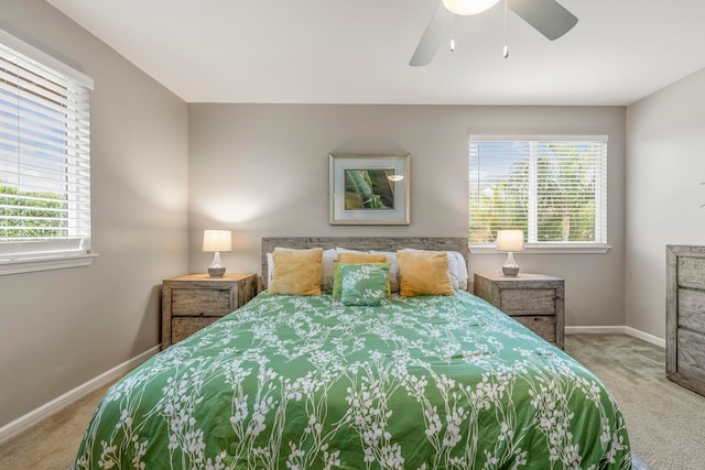 bedroom with ceiling fan and carpet flooring