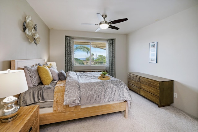 bedroom with ceiling fan and carpet floors