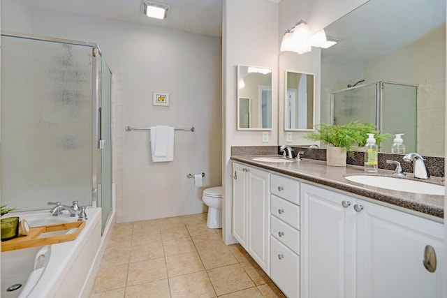 full bathroom with vanity, independent shower and bath, toilet, and tile patterned floors