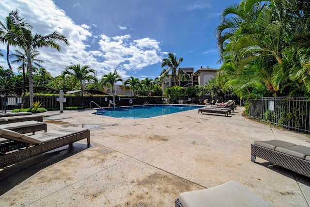 view of swimming pool with a patio area