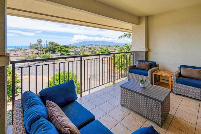 balcony featuring a mountain view