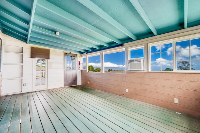 wooden deck featuring cooling unit