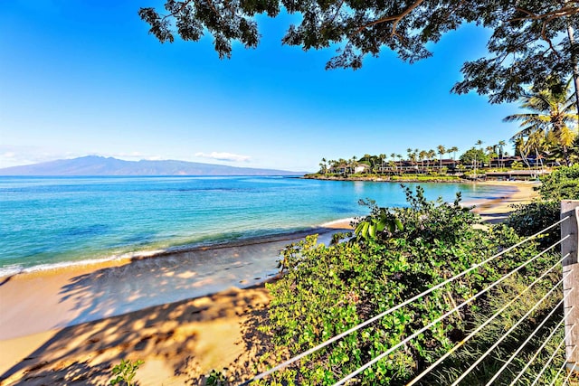 water view with a mountain view and a beach view