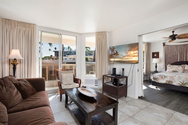 tiled living room featuring ceiling fan