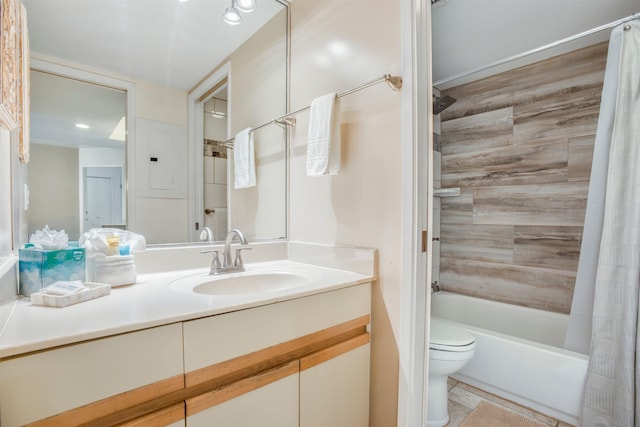 full bathroom with vanity, toilet, and shower / bath combo with shower curtain