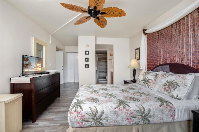 bedroom featuring ceiling fan and light hardwood / wood-style flooring