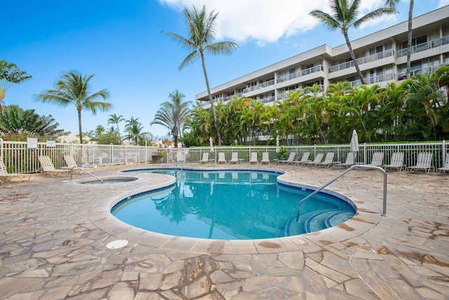 view of swimming pool with a patio area