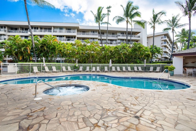 view of swimming pool featuring a patio