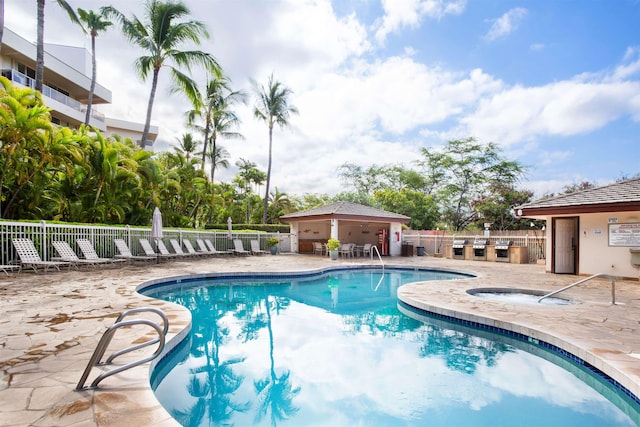 view of swimming pool featuring a patio