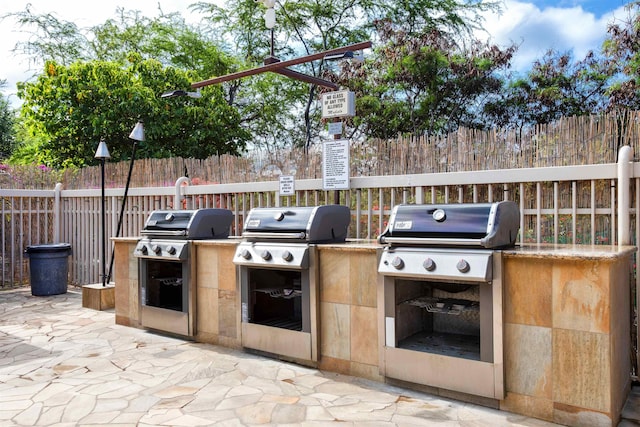 view of patio featuring area for grilling and an outdoor kitchen