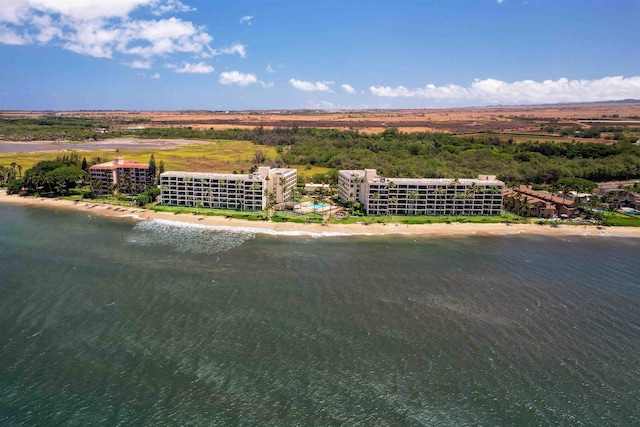 aerial view featuring a view of the beach and a water view