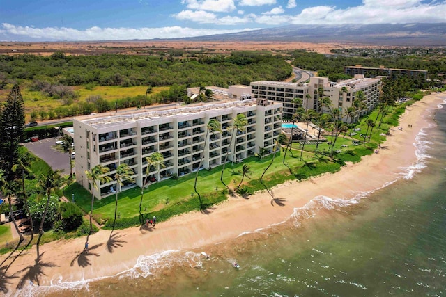 bird's eye view with a view of the beach and a water view