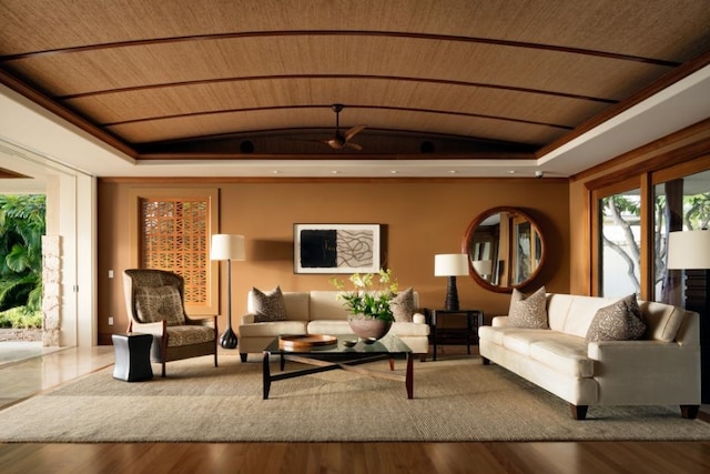 living room with wood finished floors, wood ceiling, and vaulted ceiling