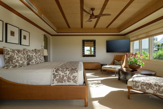 carpeted bedroom featuring wooden ceiling and arched walkways