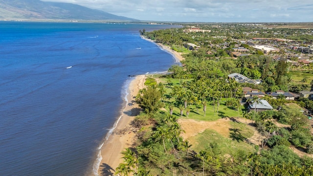 bird's eye view featuring a water and mountain view and a beach view