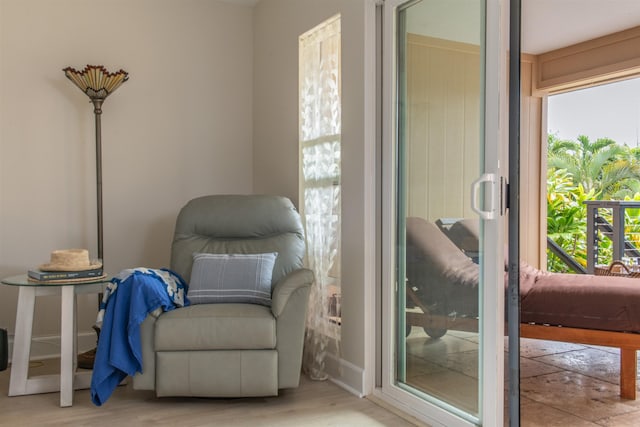 sitting room with a healthy amount of sunlight