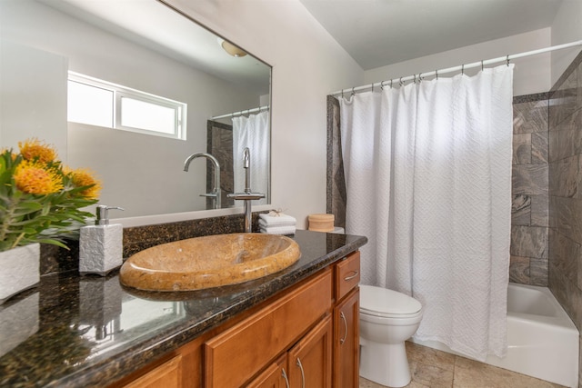 full bathroom with vanity, toilet, shower / tub combo, and tile patterned floors