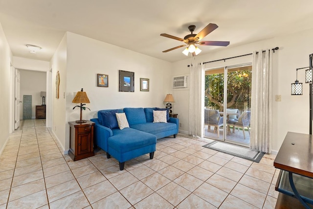 480 Kenolio Rd Unit 21-101, Kihei, HI 96753 - living room with light tile patterned floors, ceiling fan, and baseboards