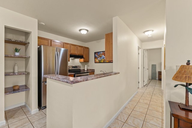 480 Kenolio Rd Unit 21-101, Kihei, HI 96753 - kitchen with appliances with stainless steel finishes, under cabinet range hood, brown cabinets, and light tile patterned floors