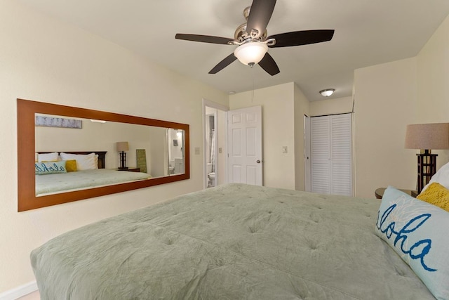 480 Kenolio Rd Unit 21-101, Kihei, HI 96753 - bedroom with a closet, a ceiling fan, and baseboards