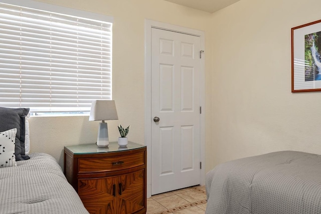 480 Kenolio Rd Unit 21-101, Kihei, HI 96753 - bedroom with light tile patterned floors