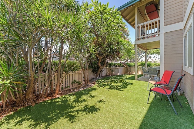 480 Kenolio Rd Unit 21-101, Kihei, HI 96753 - view of yard with a balcony and a patio