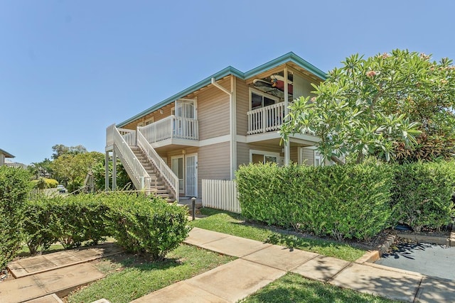 480 Kenolio Rd Unit 21-101, Kihei, HI 96753 - view of property featuring stairs