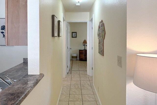 480 Kenolio Rd Unit 21-101, Kihei, HI 96753 - corridor featuring baseboards