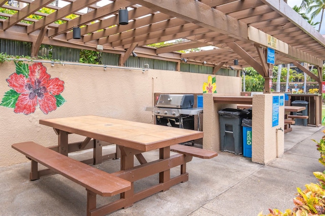 2695 S Kihei Rd Unit 1204, Kihei, HI 96753 - view of patio with outdoor dining area and a pergola
